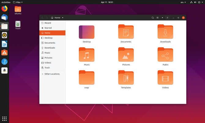 Ubuntu 19.04-bestandsbeheer met bureaubladpictogrammen op de achtergrond