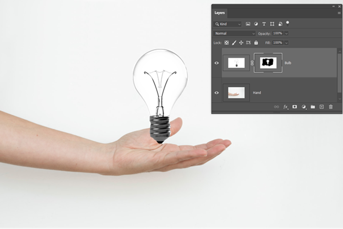 Photoshop-laag gemaskeerd beeld van hand en lamp